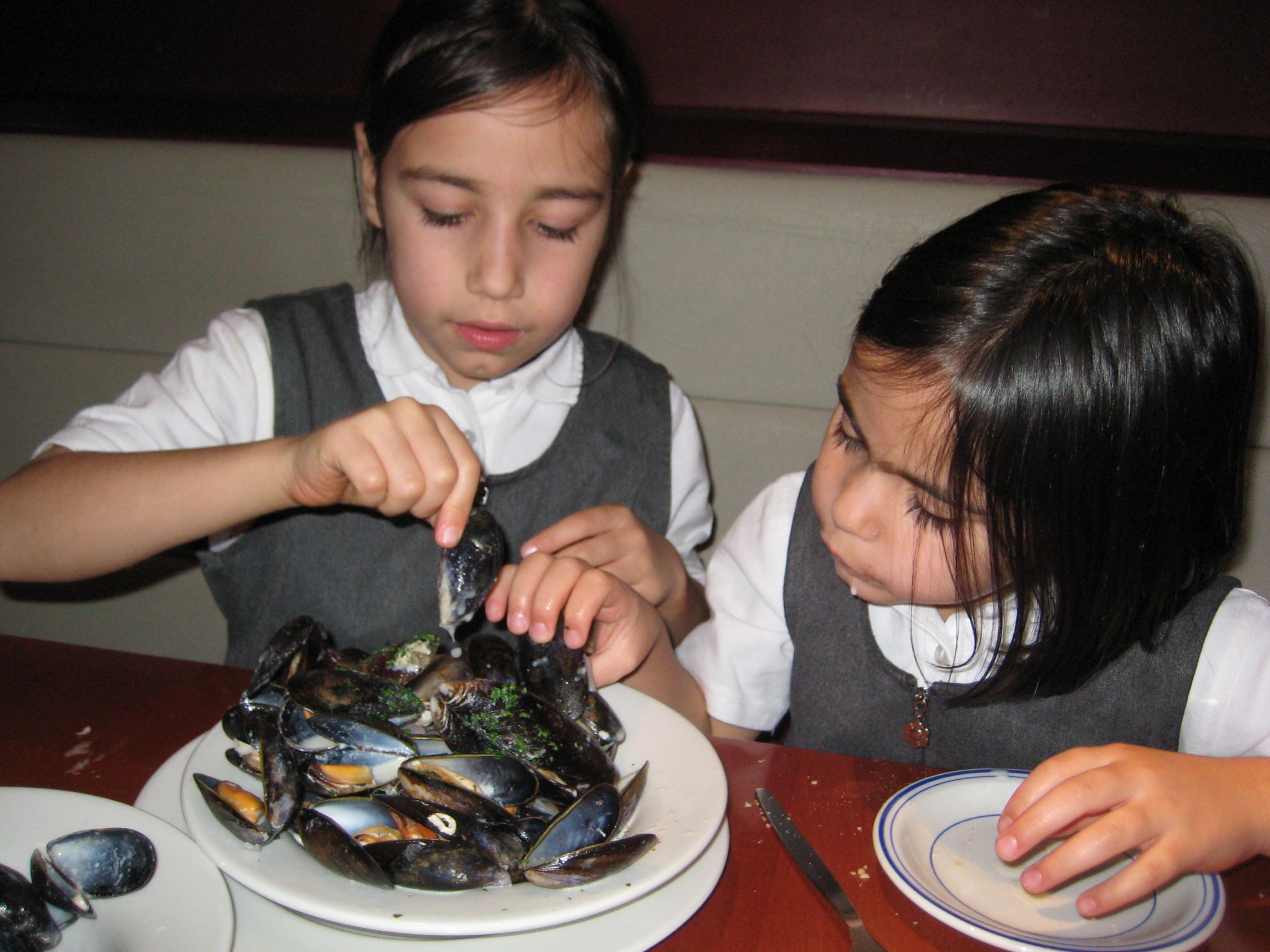 Amber and Amy demolishing mussels at Two Brothers in Finchely